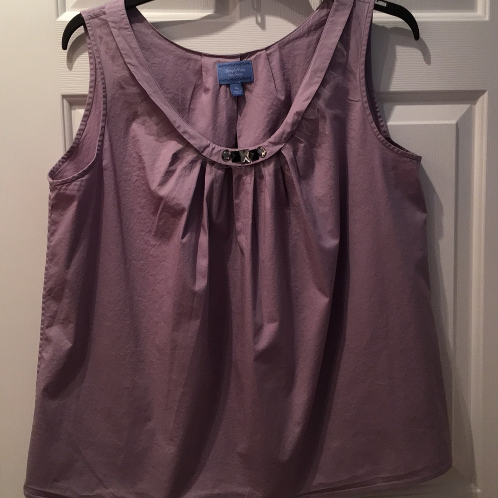 Vera wang top has embellished neck
